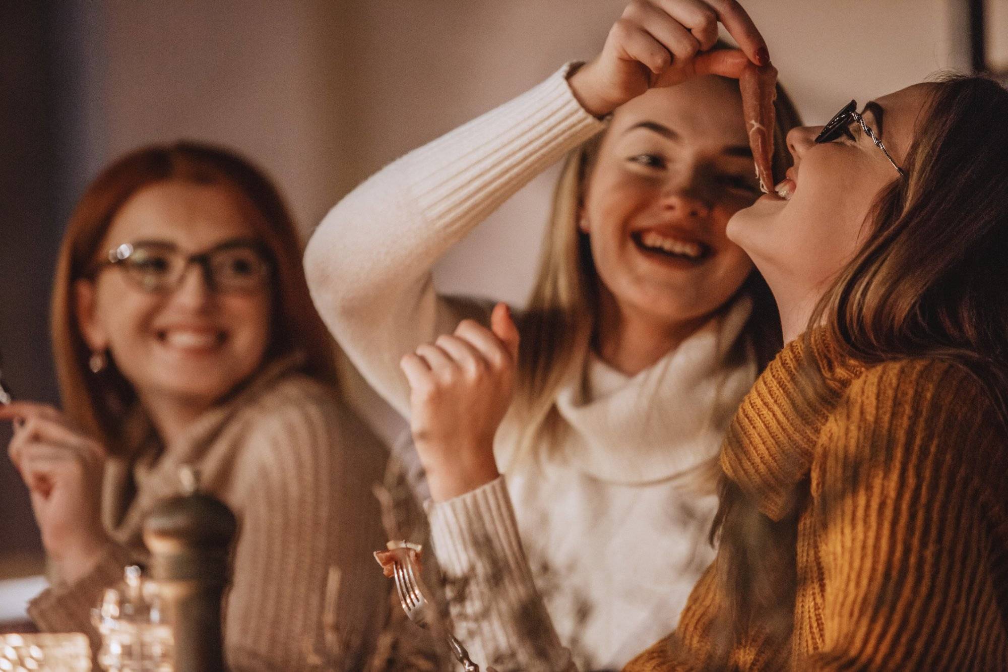 Women enjoying delicatessen